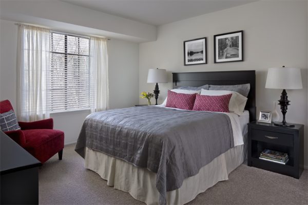 Furnished Master Bedroom with large window