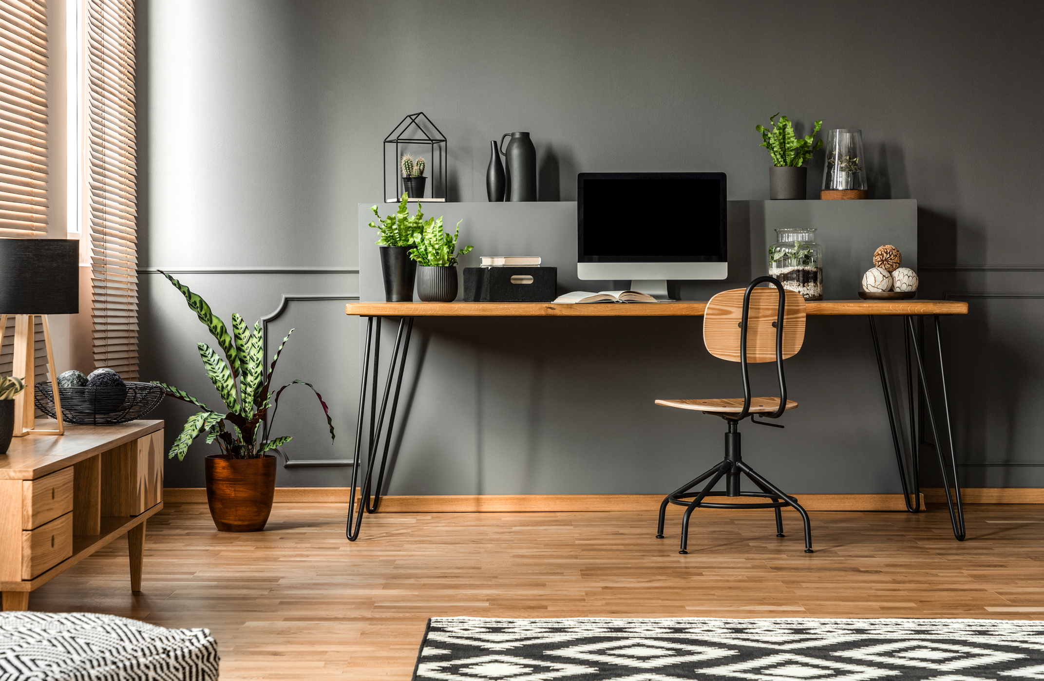 A stylish workspace that incorporates home office ideas for apartments.